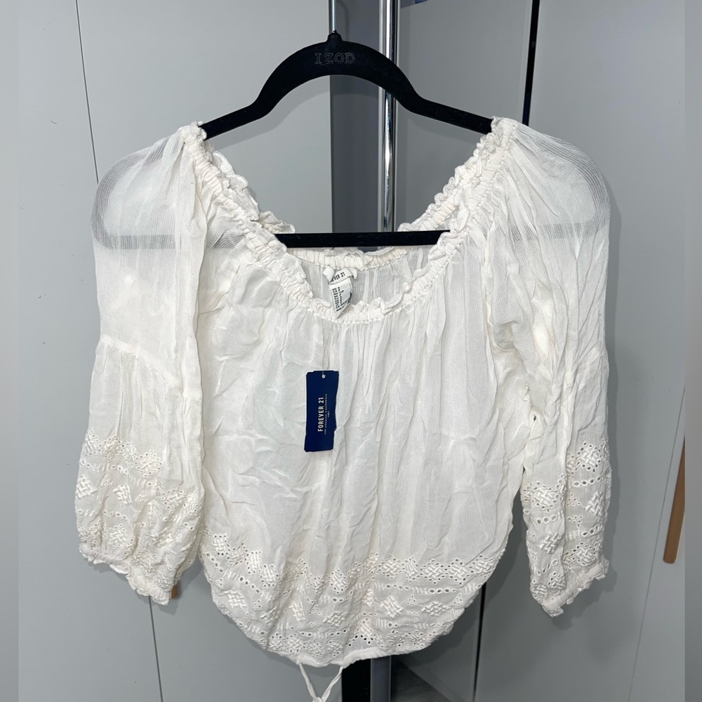 This cute blouse is from forever 21.
